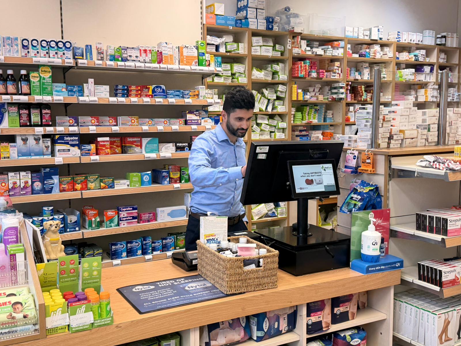 Pharmacist at the Wellsway Pharmacy counter