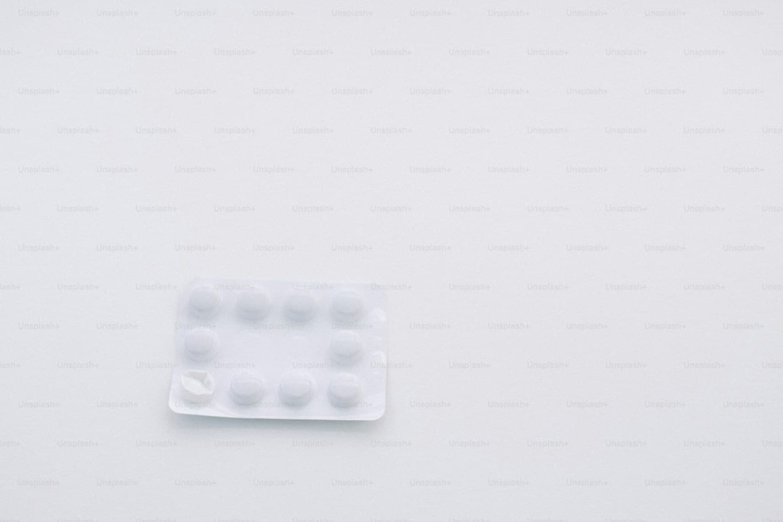 Medicine bottles on a white surface